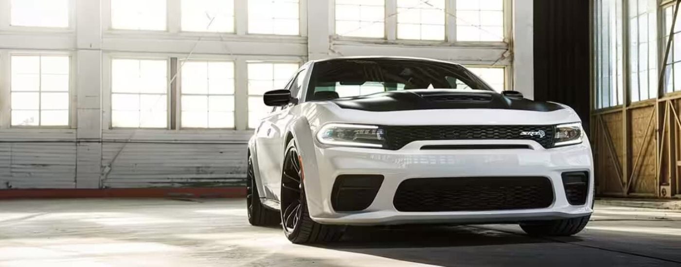 White 2023 Dodge Charger SRT backed into a spot