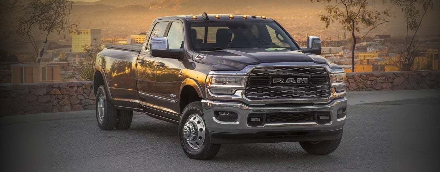 A gray 2023 Ram 3500 parked.