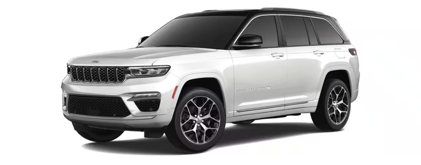 White 2025 Jeep Grand Cherokee Summit Reserve angled left