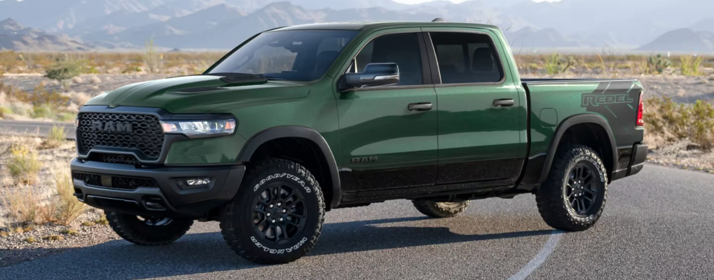 Green 2026 Ram 1500 Rebel parked at an angle