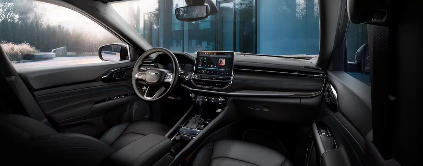 Black dash in a silver 2026 Jeep Compass.