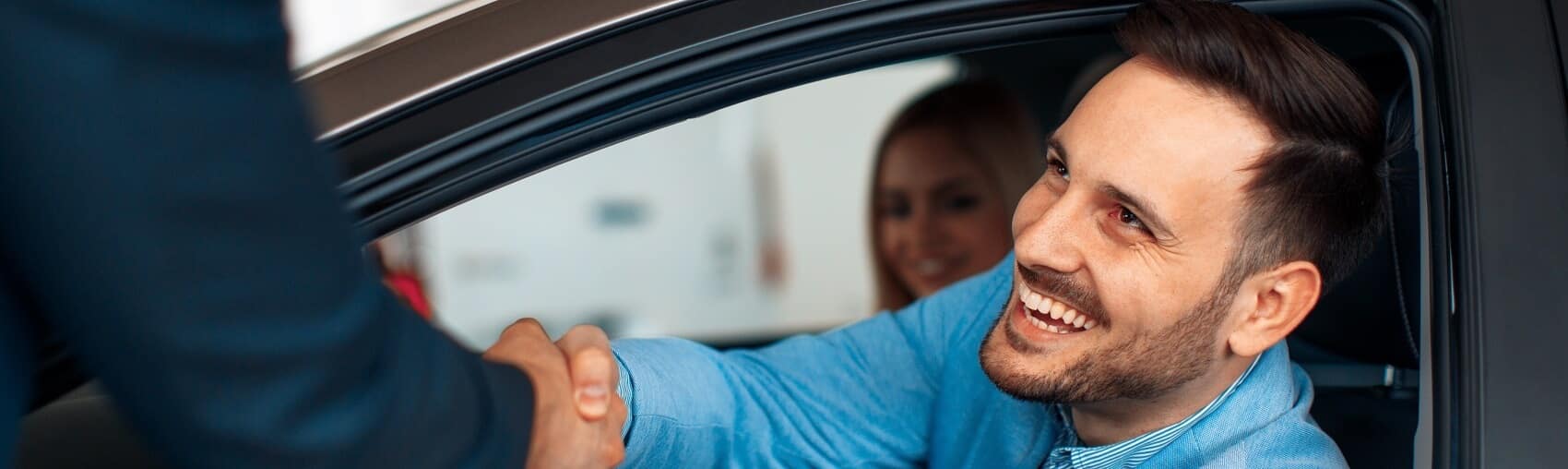 Banner of Dealer doing business with a satisfied customer
