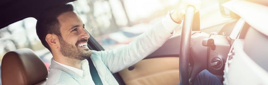 Banner of Satisfied Customer in Dealer's Car