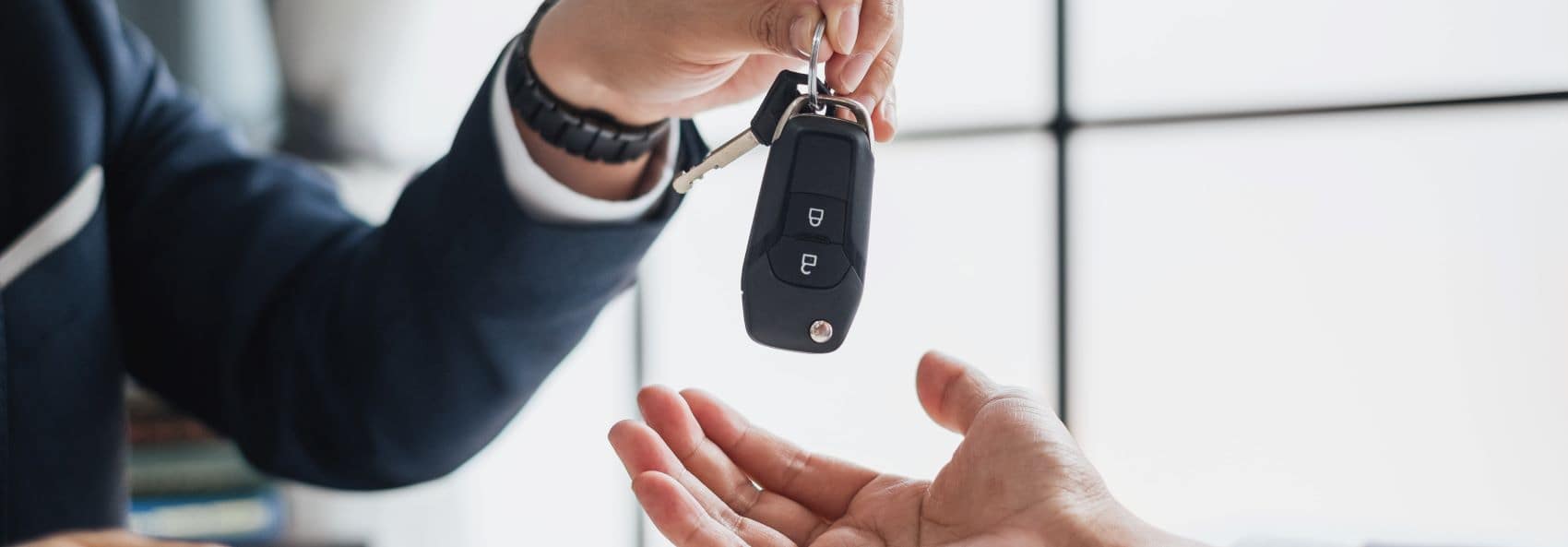 Banner of Dealer providing customer car keys